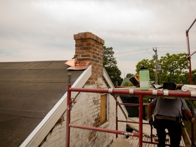 Counter-flashing detail at a chimney base — Chimney Cap Installation in Pinecrest, FL