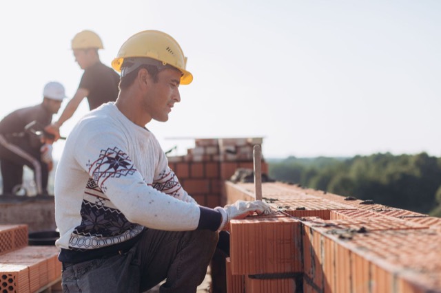 Brick courses rebuilt on a chimney stack — Chimney Rebuild in Pinecrest, FL
